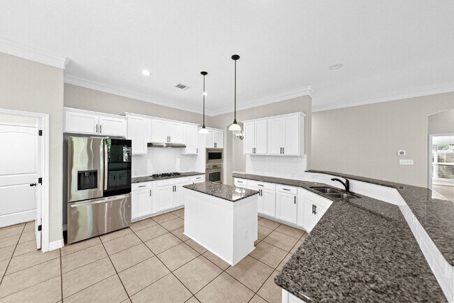 Building Photo - Corner Homesite. Gated Community. 4 Bedroo...