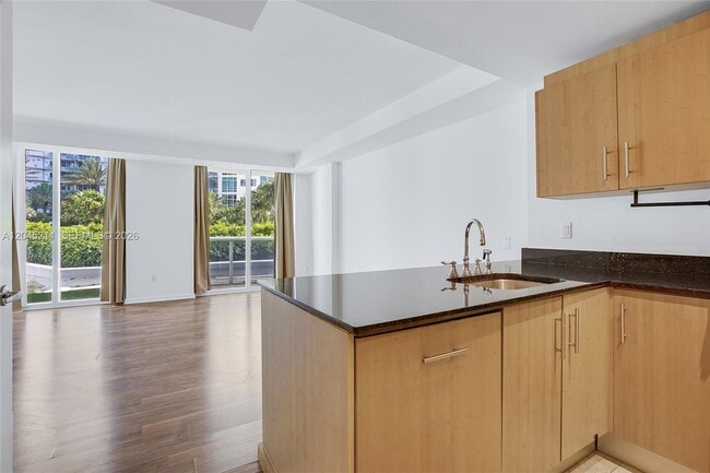Building Photo - 10275 Collins Ave