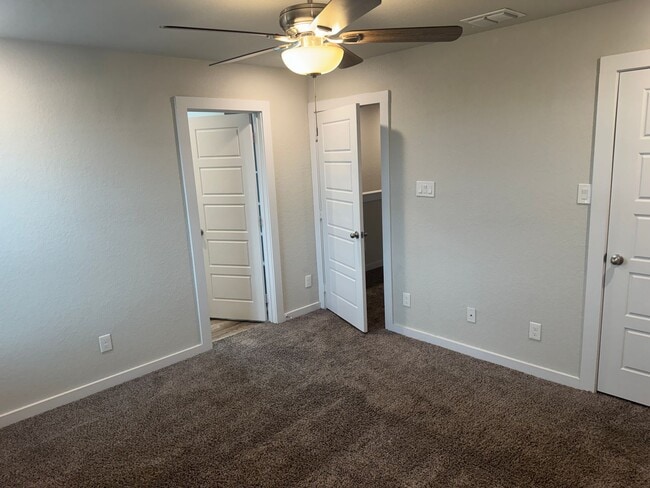 Building Photo - Stylish, Spacious & Close to It All – Your Ideal Townhome Awaits!