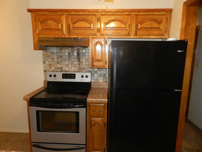 Building Photo - 4812 NW Motif Manor Blvd