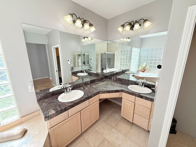 Building Photo - Spacious 4-Bedroom Home with Pool & Spa in...
