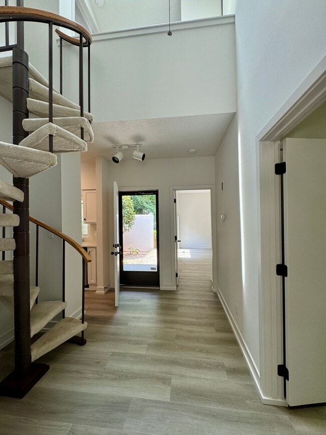 Building Photo - Spacious 2-Story Falconbridge Condo with Private Courtyard and Resort-Style Amenities
