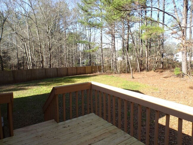Building Photo - Great location, large wooded and fenced ya...