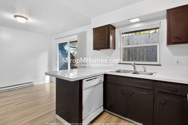 Building Photo - Three Bedroom Home in NE!