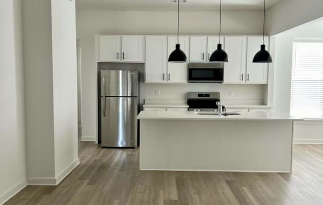 Building Photo - NEW CONSTRUCTION! NOW LEASING FOR AUGUST 2...