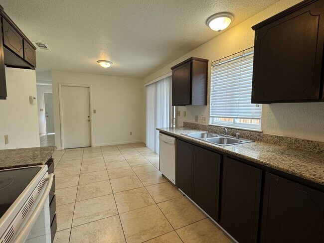 Building Photo - Four Bedroom, Two Bathroom Home For Rent