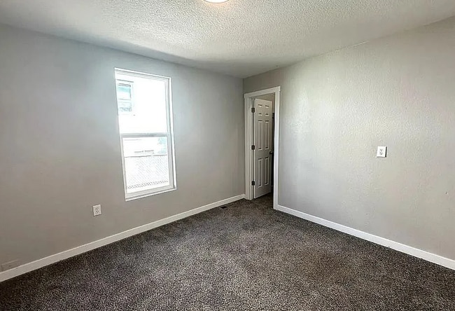 Building Photo - Modern Pet-Friendly Home with Fenced Yard in Central Pueblo!