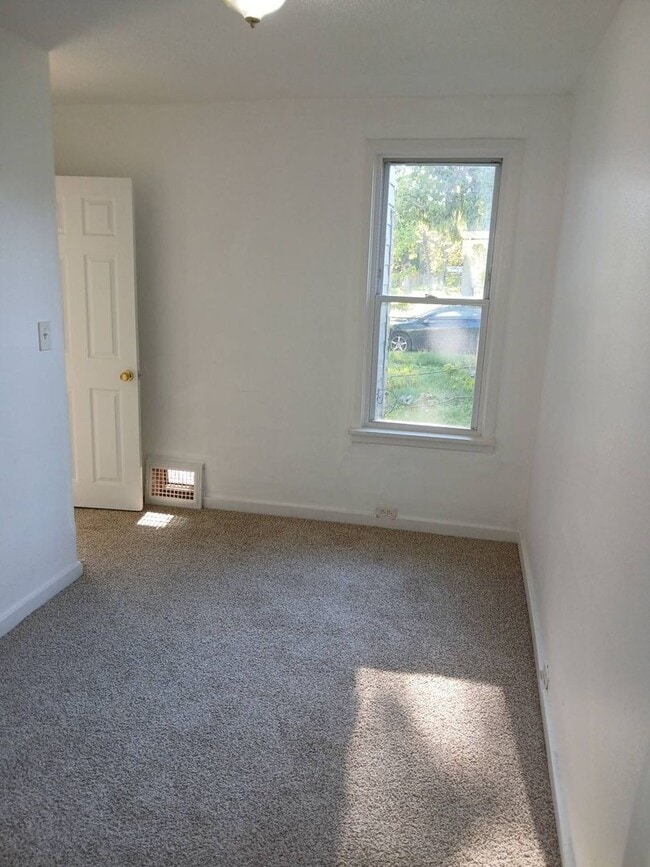Building Photo - Newly Renovated 4BR/1BA Single-Family Home with Garage – Cleveland