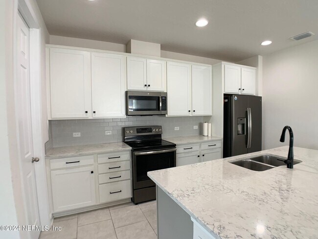 Building Photo - 1499 Tropical Pine Cove