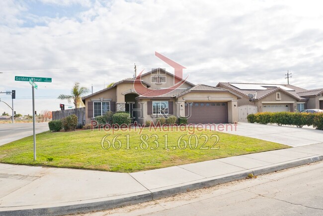 Building Photo - SW-Bakersfield  features 4 bed 2 bath with...