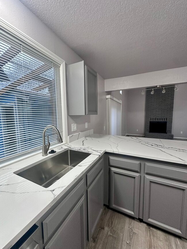 Building Photo - Charming & Spacious 3-Bedroom Duplex in the Heart of Highland!