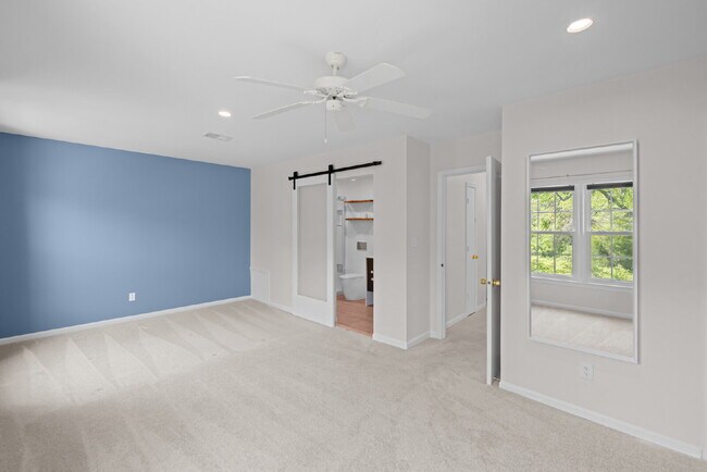 Building Photo - Completely Renovated Corner Townhome with Modern Kitchen, Designer Baths, and Private Yard