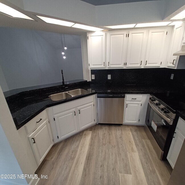 Building Photo - 7775 Mactavish Way S