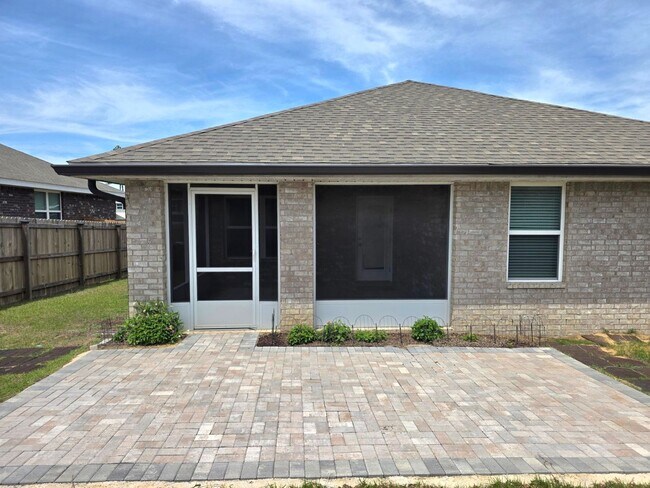Building Photo - Bright, Open Layout | Screened Porch + Paver Patio | Move-In Ready