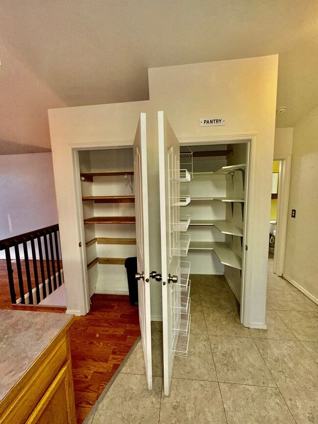 Building Photo - Check out the private fenced backyard!