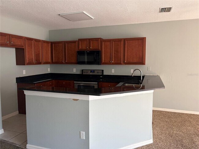 Building Photo - 9609 Carlsdale Dr