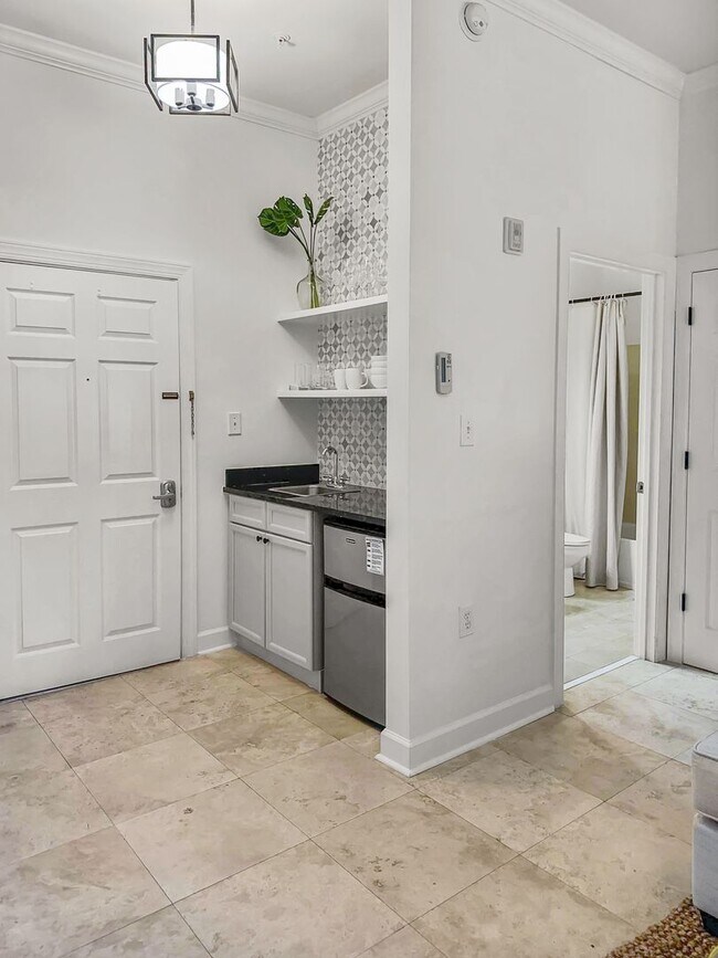 Building Photo - 50% off first months rent.  Fully furnishe...