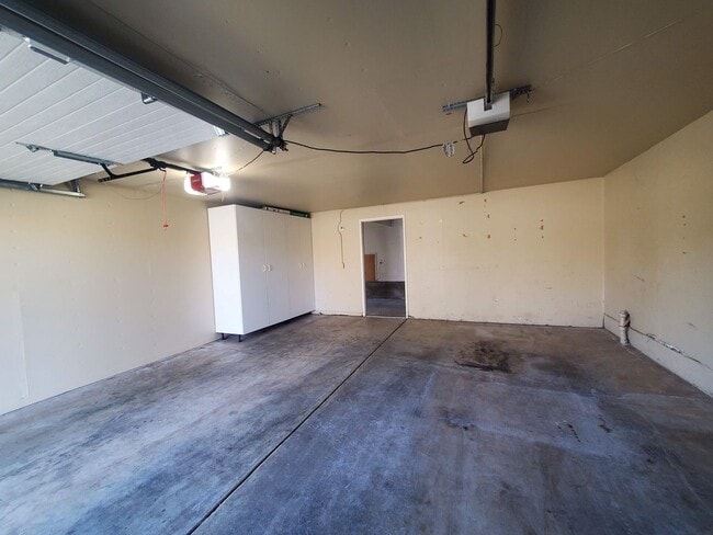 Building Photo - Private 2x2 Santa Rosa Townhouse with pool, 2-car garage, workshop area, fireplace, W/D Hookups