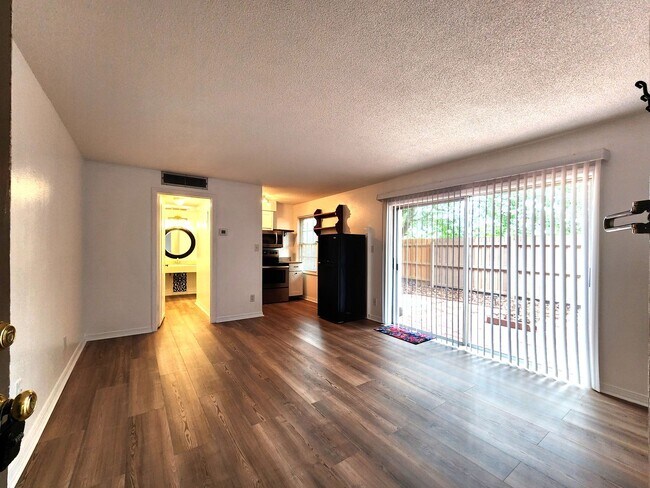 Building Photo - Charming Studio Condo Unit; Private Fenced...
