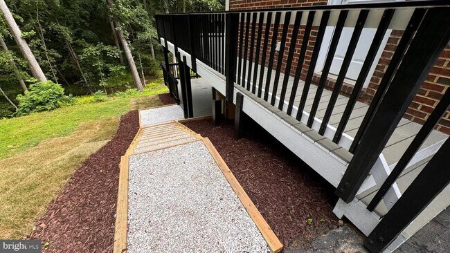 Building Photo - 10899 Woodland Falls Dr