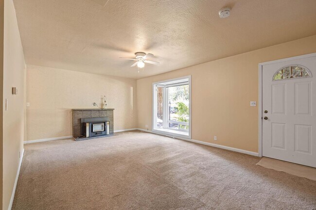 Building Photo - Charming, retro 2-bdrm/2-bath ranch in tranquil setting w/ large family room