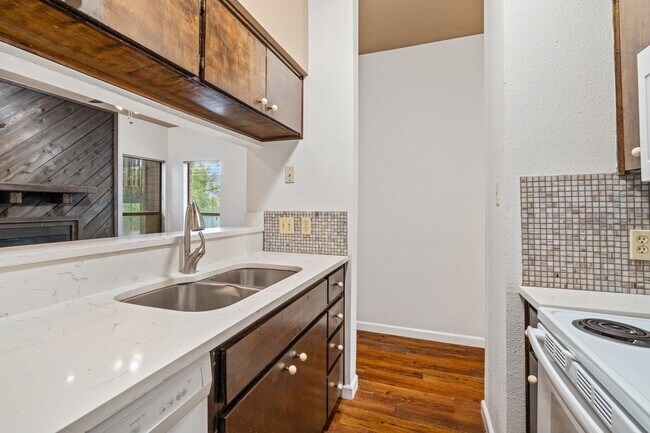 Building Photo - PARK PLACE - ACROSS FROM DKR STADIUM - 1BD / 1BA With Study - WOOD FLOORS - W/D - $1200