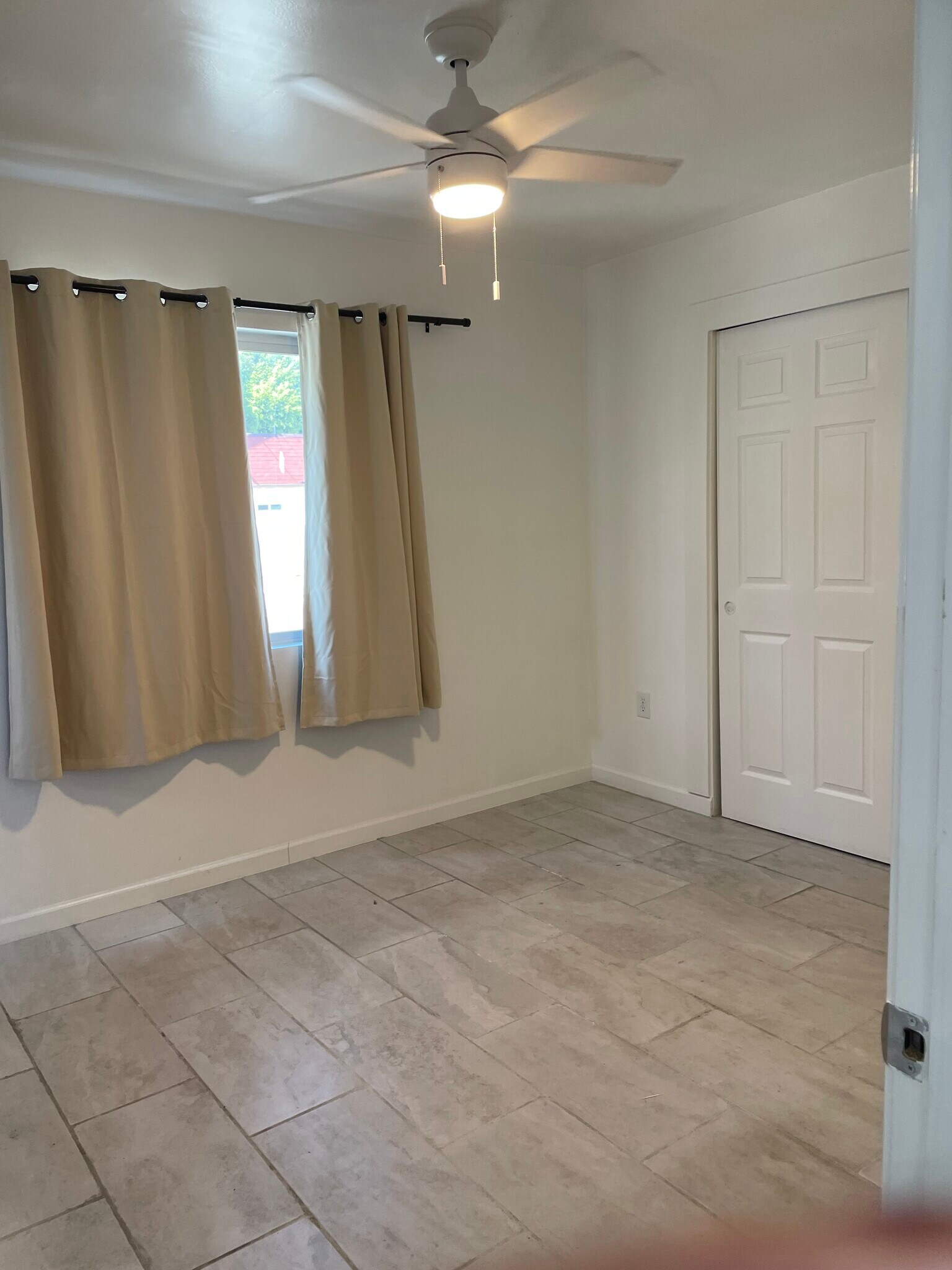 Maser Bedroom with curtain and fan - 300 S La Peer Dr