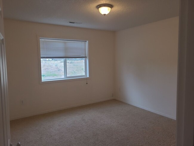 Building Photo - 4 Bedroom with Garage on a Corner Lot