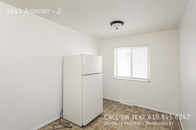 Building Photo - 2441 Airport-2