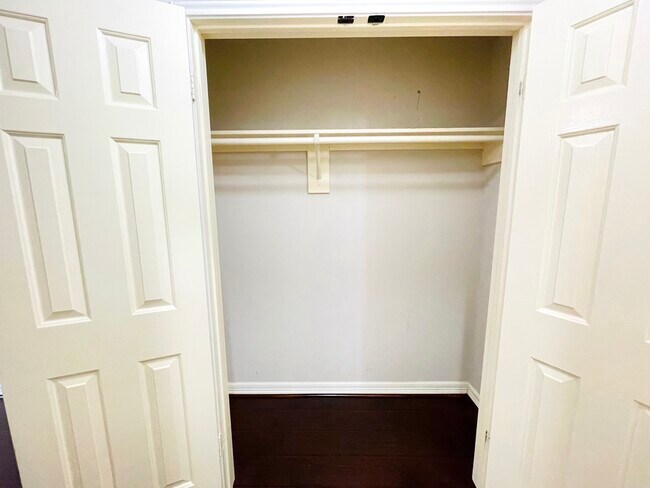 Wide "His" closet off primary bedroom - 14511 Enola Dr