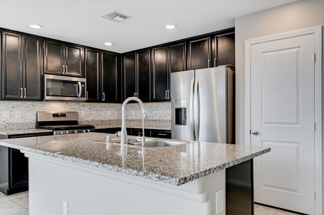 Building Photo - EXCEPTIONAL 4 BEDROOM, 3 BATHROOM HOME!