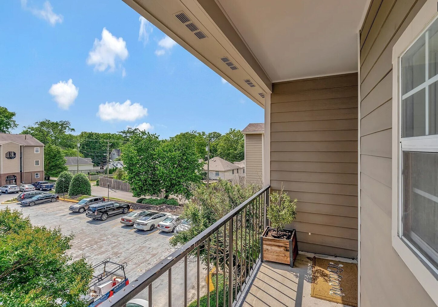 Front door looking out at the above parking lot - 145 W End Pl