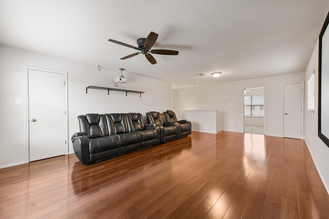 Living Room (Upstairs) *furniture, movie projector, and screen included* - 5709 Valley Stream Way