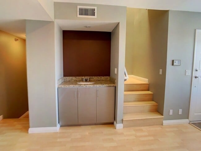 Building Photo - A Beautiful updated trilevel townhome in W Figueroa is now available for rent.