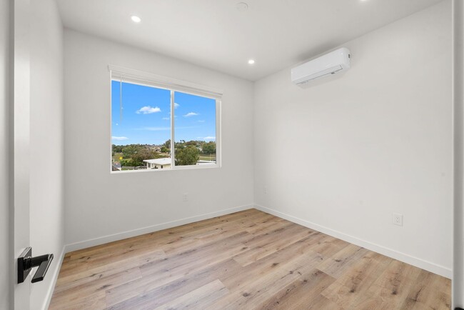 Building Photo - Introducing a stunning newly constructed t...