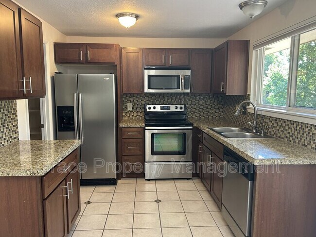 Building Photo - 10860 Stuart Cir