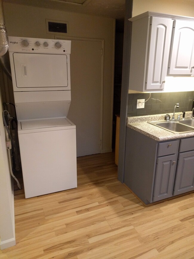 Washer/dryer.. Hall leads back to the pantry and utilities. - 4225 Sheffield Road