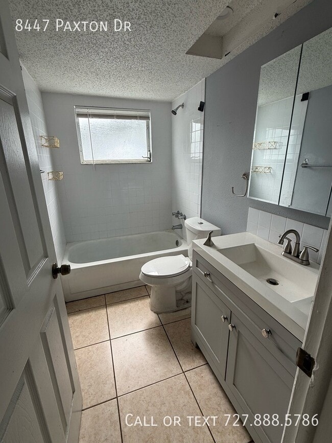 Building Photo - 8447 Paxton Dr