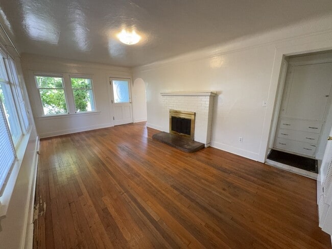 Building Photo - Sit out with your pet on the patio of this...