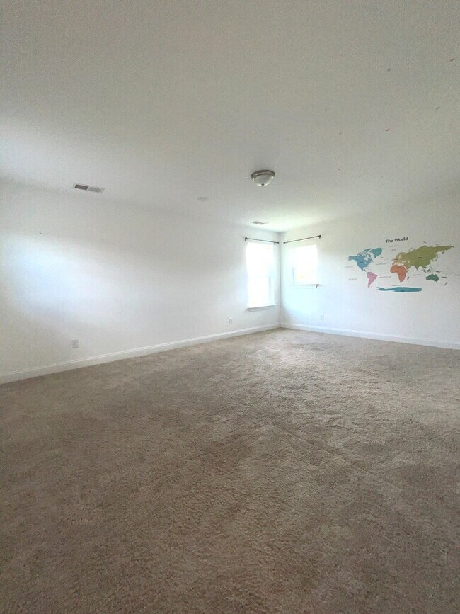 Building Photo - "Spacious 4-Bed Oasis with Stunning Lake V...