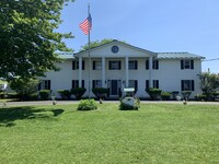 Building Photo - 8686 Tibbitts Rd