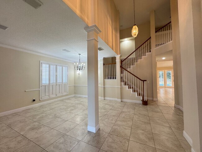 Building Photo - Spacious 4-Bedroom Home with Private Pool and Modern Comforts