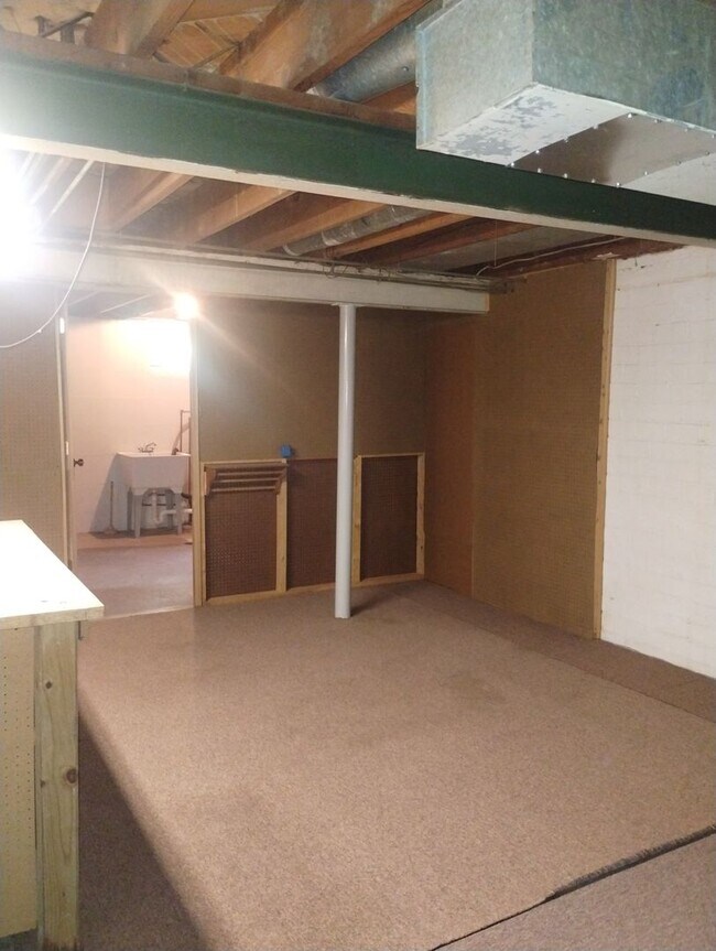 Building Photo - Quaint Duplex with a private Basement, Garage Space & Patio