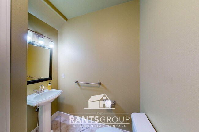 Building Photo - Meticulously Updated Townhome in Gated Community – Low Maintenance & Move-In Ready!