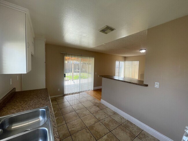 Building Photo - Palmdale 3 + 2 Available Now