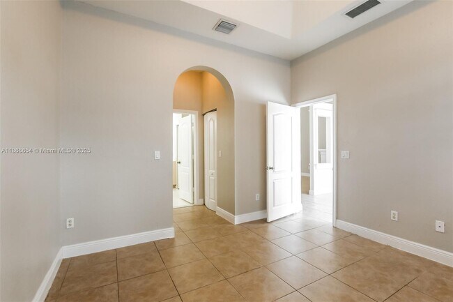 Building Photo - 1695 NE 37th Pl