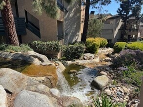 Building Photo - Spacious 2-Bedroom Condo with Rare 2-Car G...
