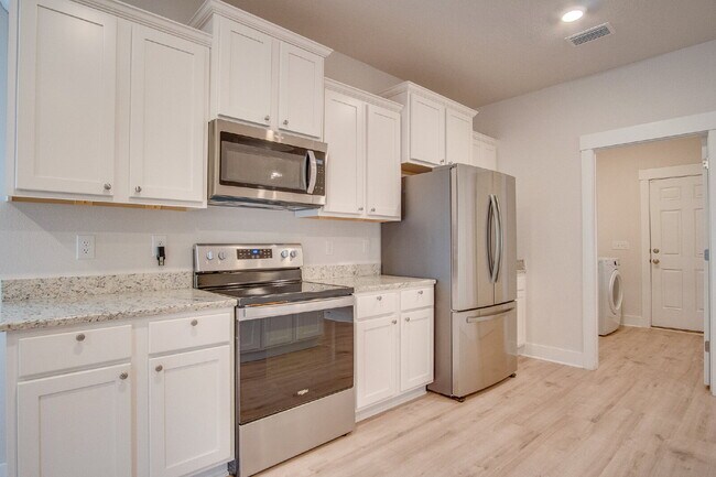 Building Photo - Deer Run 4-Bedroom Rental with 3-Car Garag...