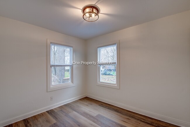 Building Photo - 1665 W 40th Ave