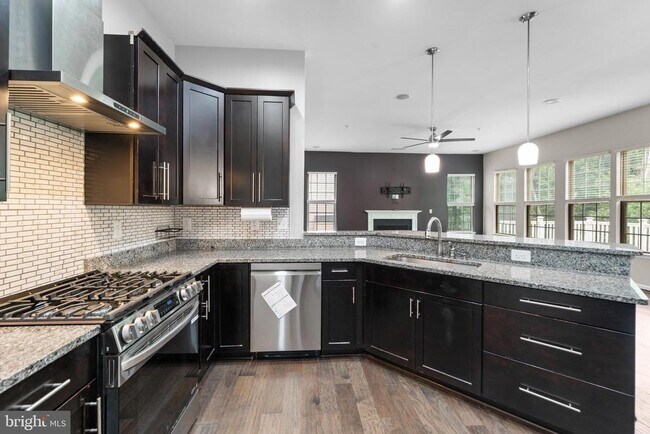 Building Photo - 7570 Arundel Woods Dr